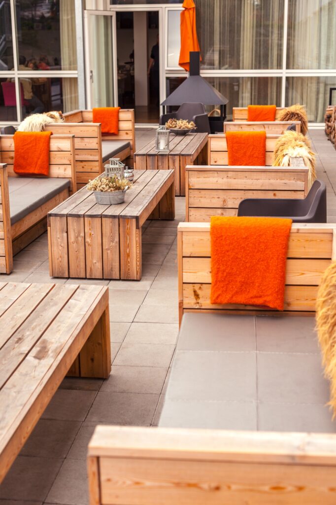 Outdoor restaurant terrace with wooden furniture